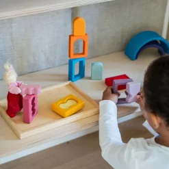 Bauspiel Fenster | 16 bunte Holzteile im Holzrahmen