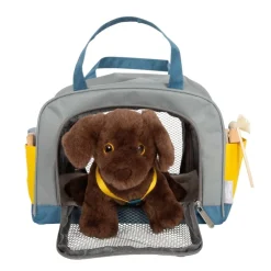 Hund mit Tasche und Pflege-Set