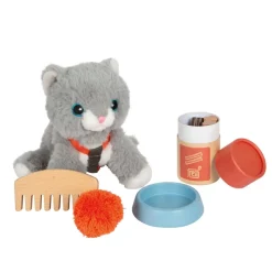 Katze mit Tasche und Pflege-Set