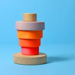 Kleiner Scheibenturm aus Naturholz | Neonpink