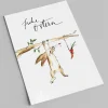 Postkarte zu Ostern | Hängender Hase mit seiner Karotte | Frohe Ostern